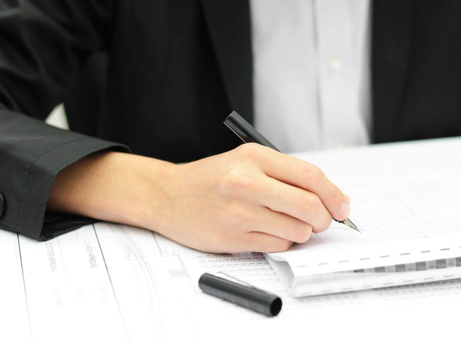 Level on floor drain showing it is positioned incorrectly.